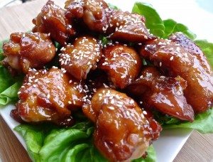 Charcoal Grilled Perfect BBQ Chicken Wings - Plated on bed of lettuce