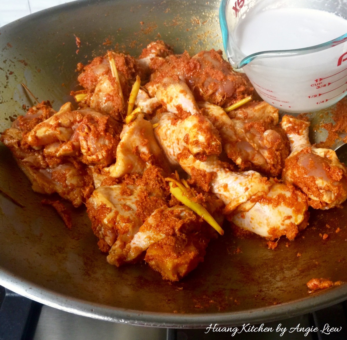 Traditional Malaysian Chicken Rendang recipe - add coconut milk