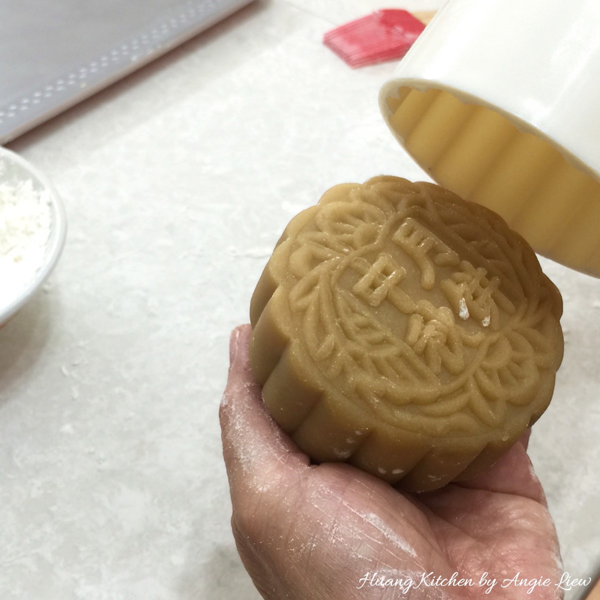 Traditional Baked Mooncakes Recipe by Huang Kitchen - Shaped mooncake with decoration imprint