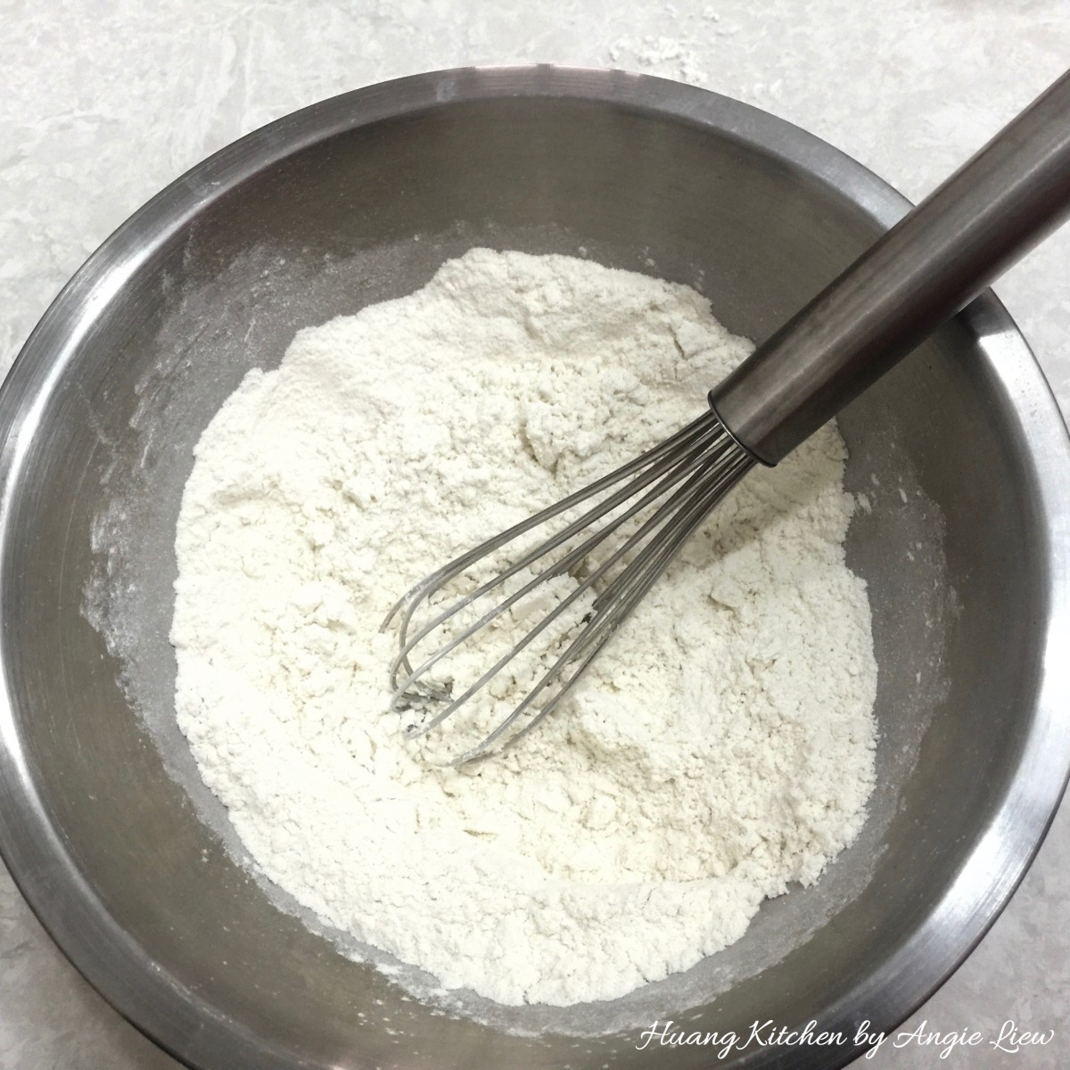 Christmas Thumbprint Cookies Recipe - whisk flour