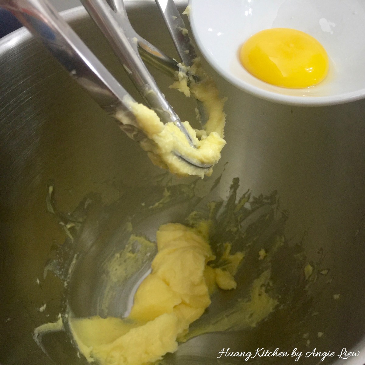 Christmas Thumbprint Cookies Recipe - add yolk