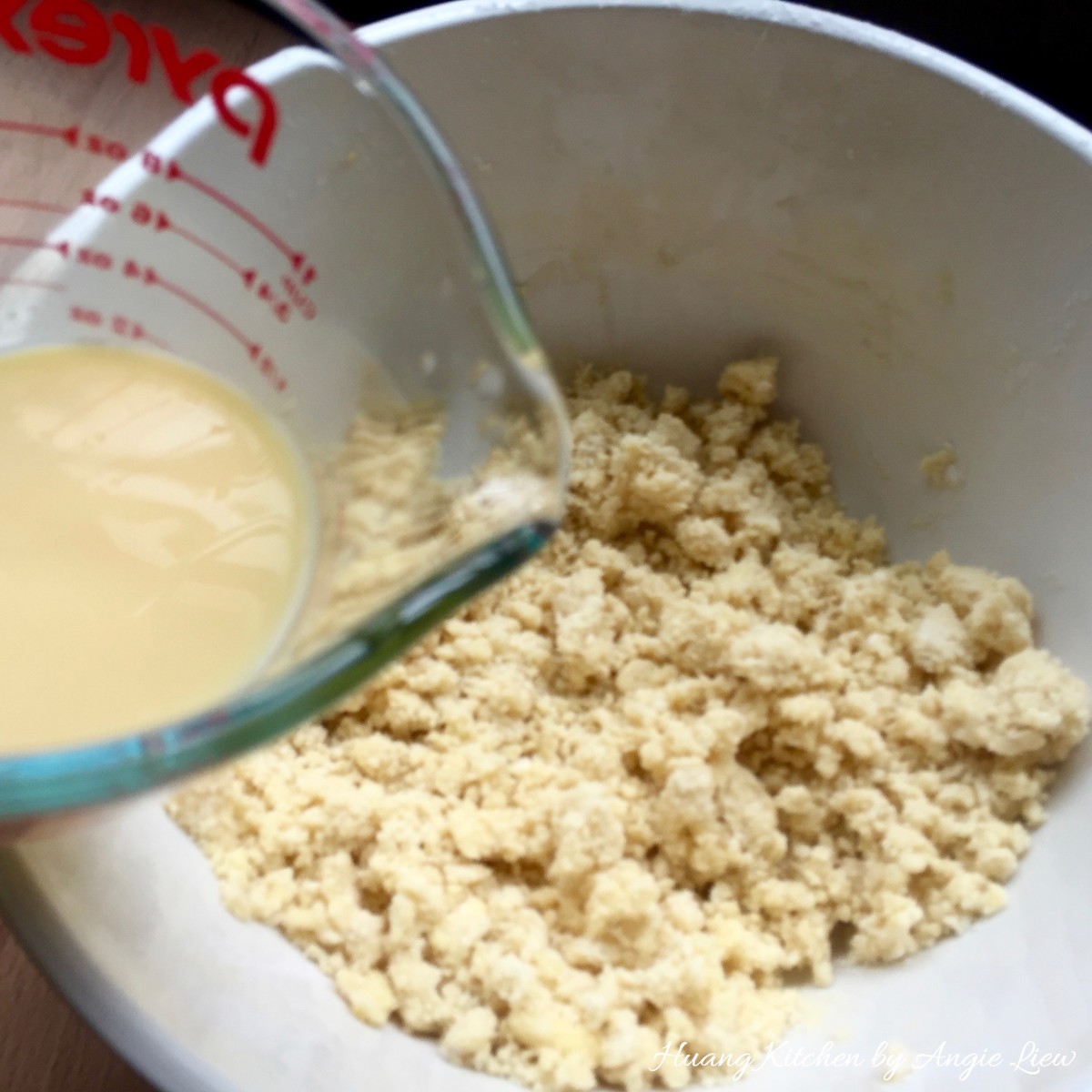 Dainty Pineapple Tarts - combine yolk and flour mixture