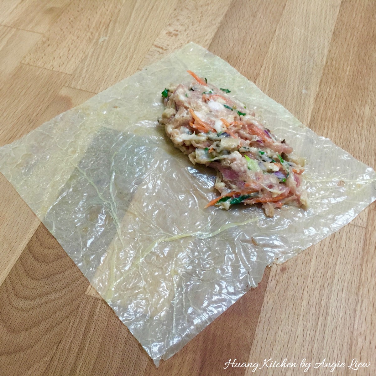 Chinese Meat Rolls Recipe (Loh Bak/Ngo Hiang) - wrapping meat roll