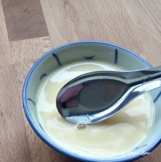 Steamed Egg Pudding Recipe - use spoon to remove bubbles