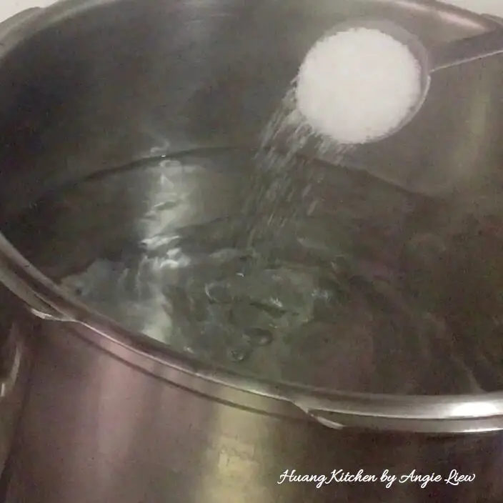 Boil water in pot.
