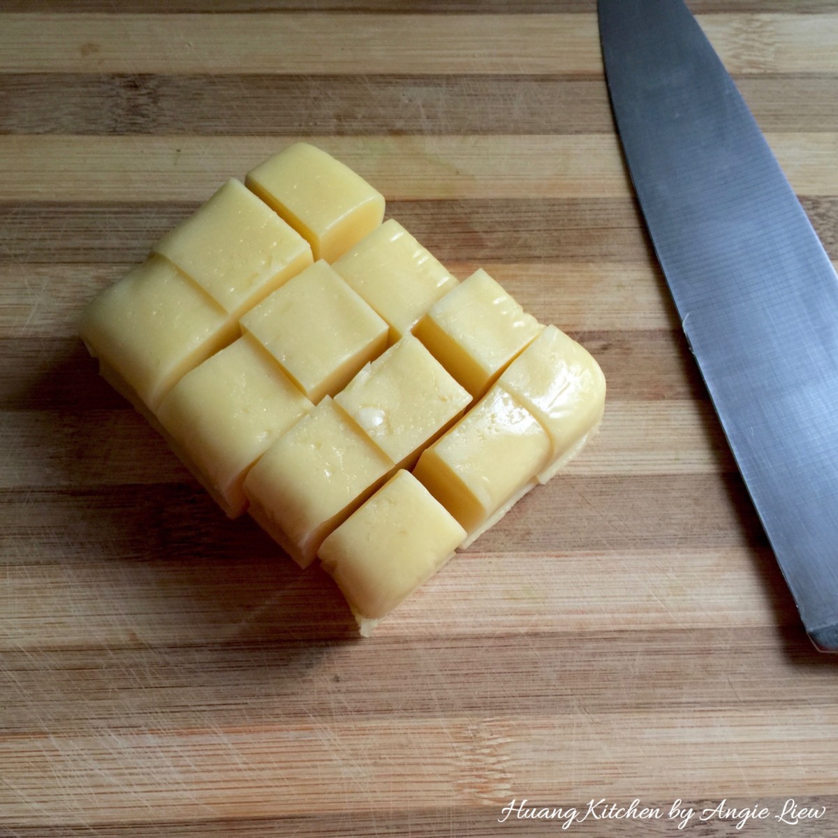 Cut cheese into 1 inch cube.