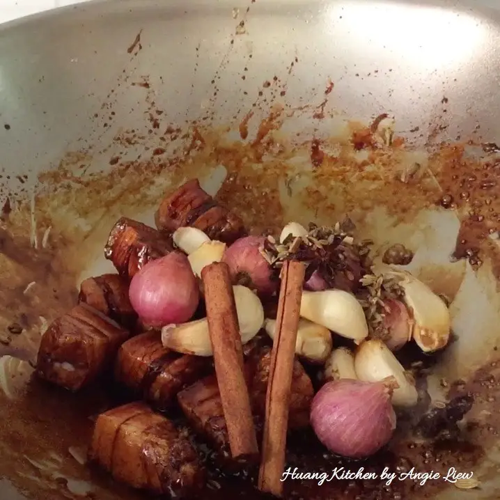 Add garlic, shallots and spices.