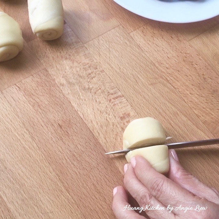 Cut the rolled dough in halves.