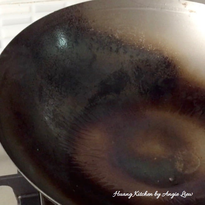 Reheat wok with oil.