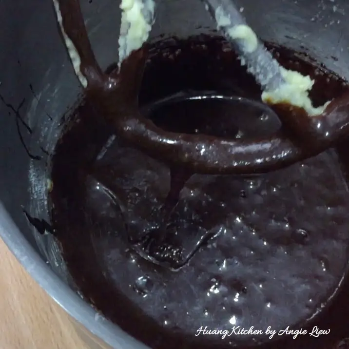 Beat molasses into the batter.