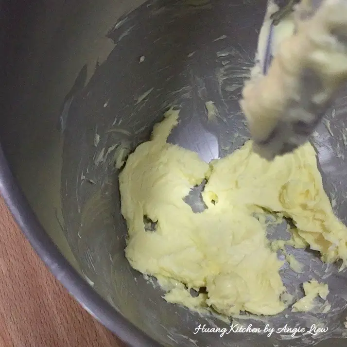 Beat butter till soft and creamy.