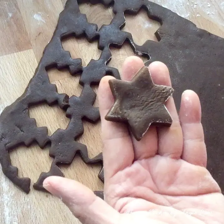 Cut the cookies with cookie cutter.