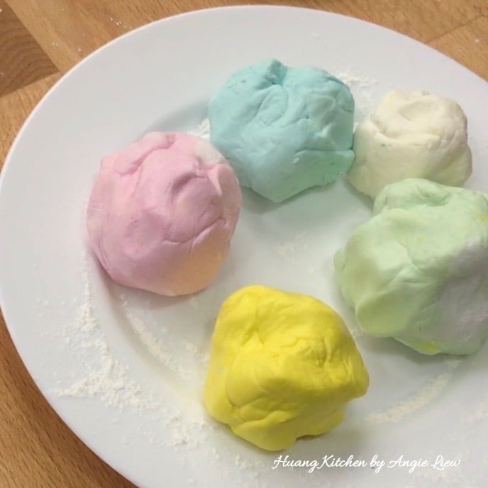 Add green, blue and yellow food colouring.