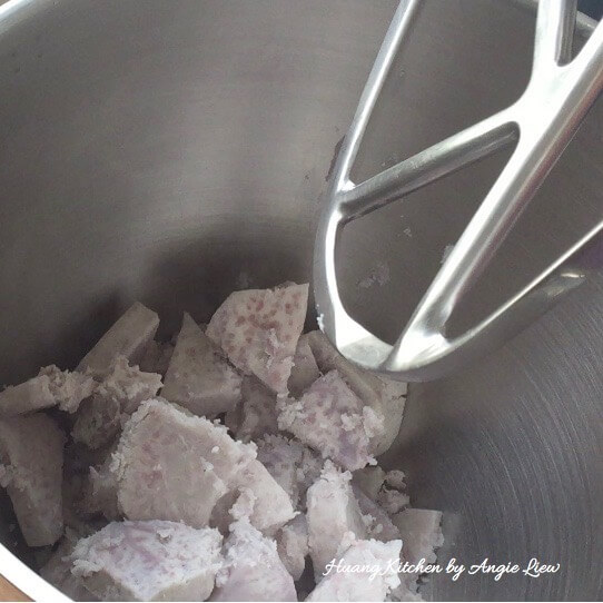 Transfer cooked yam to mixer.