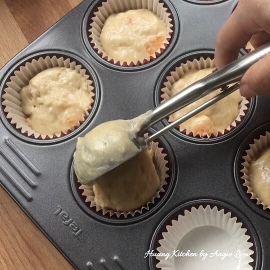 Spoon mixture into muffin cups.