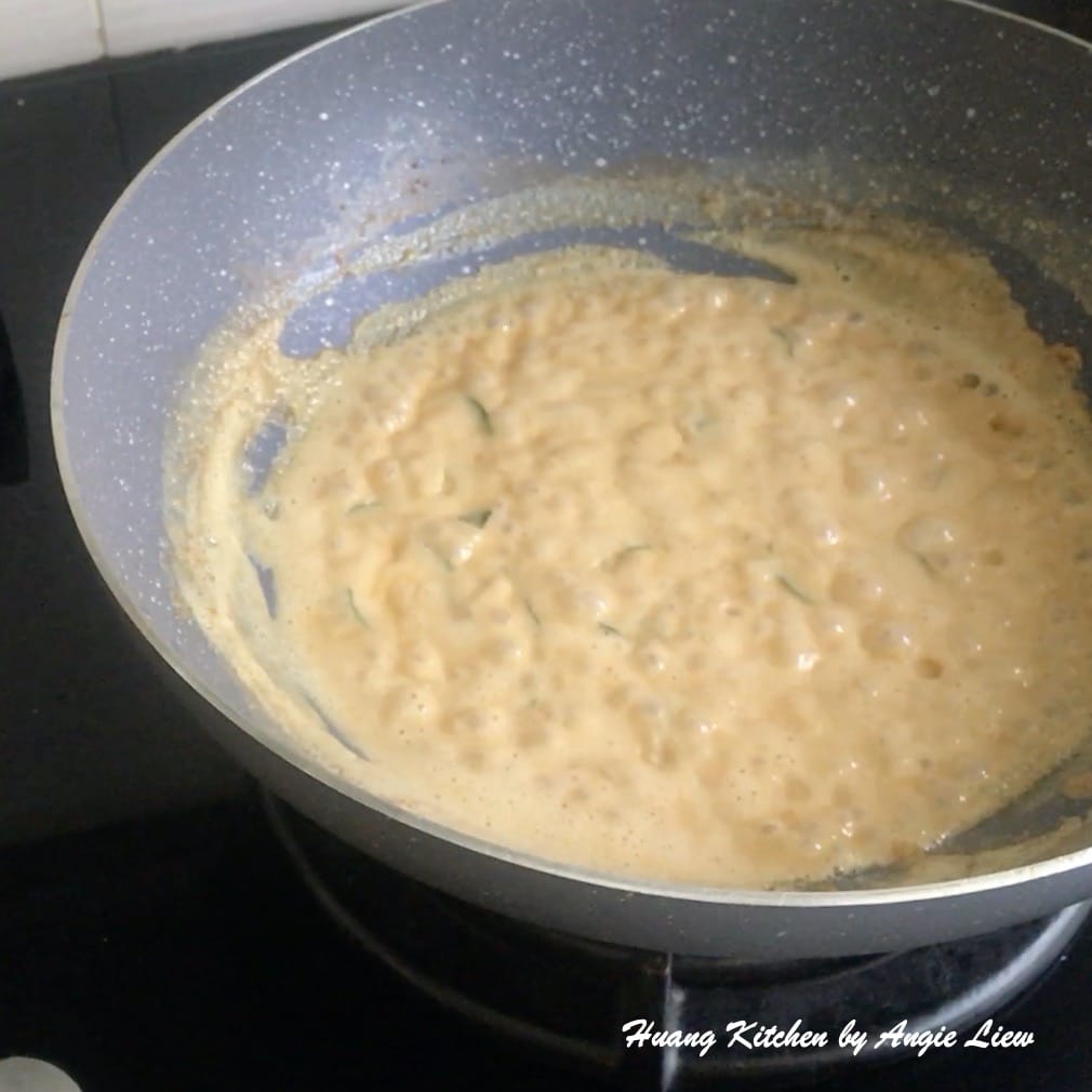 Bring the salted egg sauce to a boil.