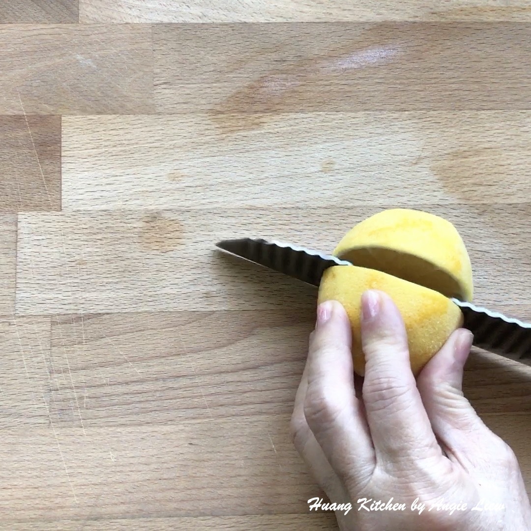 Cut lemon in halves.