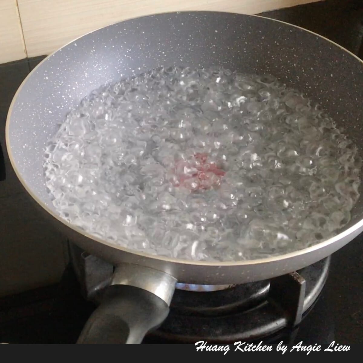 Boil water to scald egg noodles.