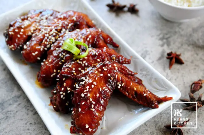 Soy Sauce Chicken Wings (See Yao Hong Siu Gai Yik) 豉油红烧鸡翼 Recipe by Huang Kitchen - close up of wings on plate with star anise