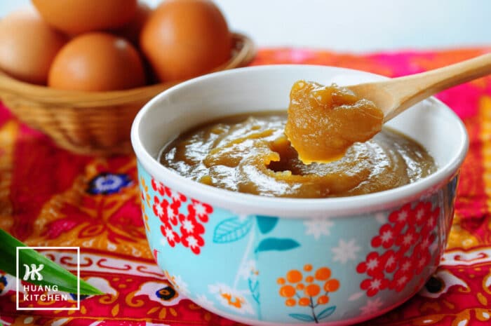 Homemade Caramel Kaya Recipe by Huang Kitchen - Kaya in a bowl, scooped out with wooden spoon