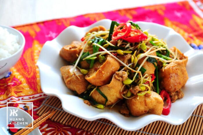 Stir Fry Beancurd Puffs With Soy Bean Sprouts - dish with batik backrground