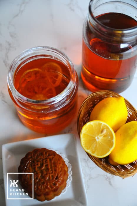 Golden Syrup For Mooncake Recipe by Huang Kitchen - Vertical glass jars with lemons and traditional baked mooncake