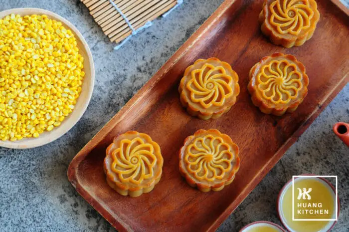 Baked Durian Mung Bean Paste Mooncake Recipe by Huang Kitchen - Top down view of mooncakes with mung bean and chinese tea