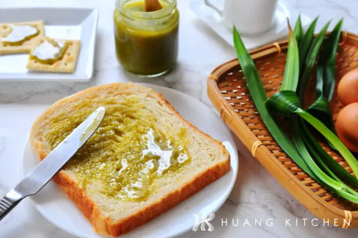 Homemade Pandan Kaya Recipe (How To Make Coconut Egg Jam) 香兰咖椰酱食谱(斑斓咖椰做法) by Huang Kitchen - Kaya spead on toasted bread and crackers with eggs and pandan leaf in background