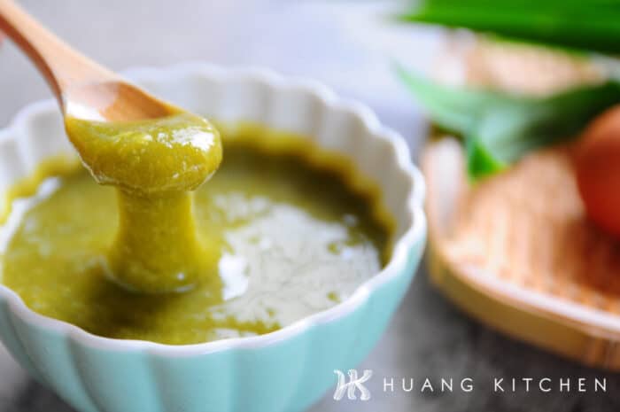 Homemade Pandan Kaya Recipe (How To Make Coconut Egg Jam) 香兰咖椰酱食谱(斑斓咖椰做法) by Huang Kitchen - close up of pandan Kaya on wooden spoon 
