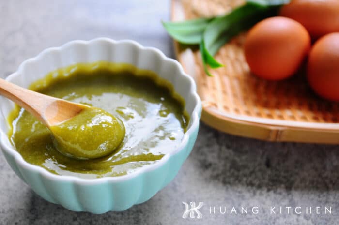 Homemade Pandan Kaya Recipe (How To Make Coconut Egg Jam) 香兰咖椰酱食谱(斑斓咖椰做法) by Huang Kitchen - Kaya on wooden spoon with eggs and pandan leaf in background