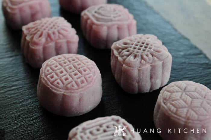 Yam Paste Snow Skin Mooncakes Recipe by Huang Kitchen - side view of mooncakes on black plate